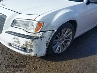 2011 Chrysler 300 with VIN 2C3CA6CT9BH581181, listed as a IAAI auction lot 41981733 with 156,460 mi miles. Bid and sale history available at carsss.com. Image 6.