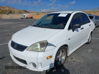 2006 Suzuki Aerio Premium z VIN JS2RA62S365300350, wystawiony jako IAAI lot #41492651 z przebiegiem 158 230 mil mil oraz . Historia ofert i sprzedaży dostępna na DreamBid. Obrazek 2.