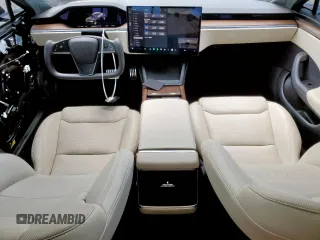 2022 Tesla Model S с VIN 5YJSA1E50NF492117, выставлен на аукционе Copart как лот 54307855 с пробегом 42 940 миль миль и Списание • Salvage title. История ставок и продаж доступна на DreamBid. Изображение 8.