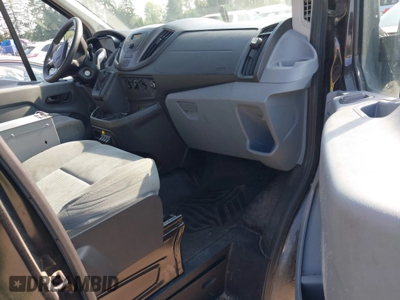 2015 Ford Transit Cargo z VIN 1FTYR2CM4FKA84548, wystawiony jako IAAI lot #42561069 z przebiegiem 174 469 mil mil oraz . Historia ofert i sprzedaży dostępna na DreamBid. Obrazek 5.