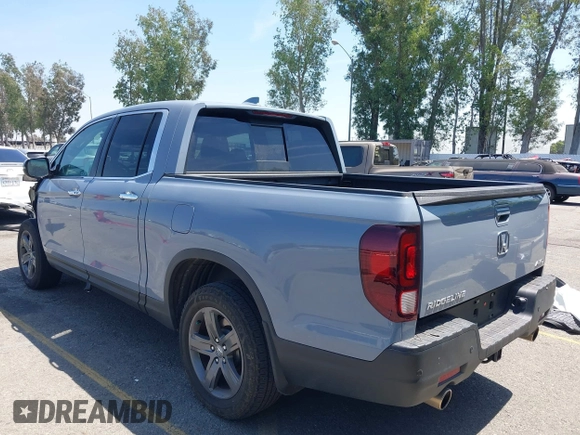 2022 Honda Ridgeline RTL-E z VIN 5FPYK3F78NB028776, wystawiony jako IAAI lot #42077805 z przebiegiem 22 971 mil mil oraz . Historia ofert i sprzedaży dostępna na DreamBid. Obrazek 3.