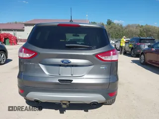 2014 Ford Escape SE with VIN 1FMCU9G99EUB13371, listed as a IAAI auction lot 42167417 with 140,145 mi miles and . Bid and sale history available at DreamBid. Image 16.