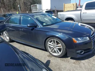 2016 Audi A8 L 4.0T Sport with VIN WAU43AFD1GN022253, listed as a IAAI auction lot 41858053 with 219,517 mi miles. Bid and sale history available at carsss.com. Image 13.