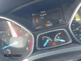 2017 Ford Escape SE z VIN 1FMCU0G95HUE86116, wystawiony jako IAAI lot #42397021 z przebiegiem 115 573 mil mil oraz . Historia ofert i sprzedaży dostępna na DreamBid. Obrazek 7.
