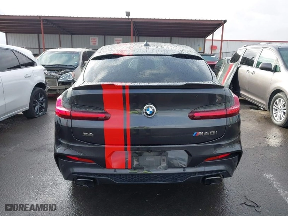 2021 BMW X4 M40i with VIN 5UX2V5C0XM9E16773, listed as a IAAI auction lot 41230634 with 52,779 mi miles. Bid and sale history available at carsss.com. Image 17.