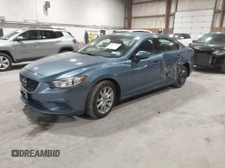 2014 Mazda 6 i Sport with VIN JM1GJ1U61E1148983, listed as a IAAI auction lot 41977553 with 100,668 mi miles and . Bid and sale history available at DreamBid. Image 2.