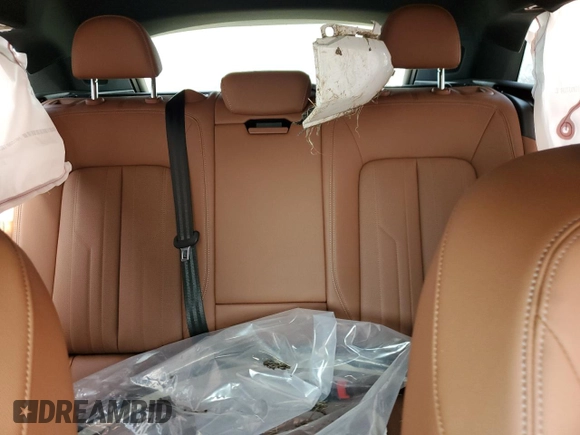 2024 Audi Q8 e-tron Premium Plus z VIN WA15AAGE8RB017425, wystawiony jako Copart lot #66139974 z przebiegiem Nie podano mil oraz Szkody całkowita. Historia ofert i sprzedaży dostępna na DreamBid. Obrazek 10.