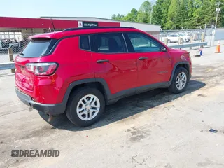 2018 Jeep Compass Sport with VIN 3C4NJCABXJT308768, listed as a IAAI auction lot 42420499 with 84,285 mi miles and . Bid and sale history available at DreamBid. Image 4.