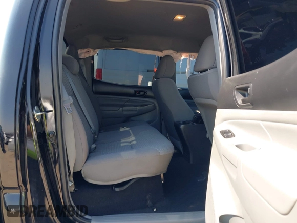 2014 Toyota Tacoma PreRunner with VIN 3TMKU4HN0EM040104, listed as a IAAI auction lot 41619179 with 171,542 mi miles and . Bid and sale history available at DreamBid. Image 8.