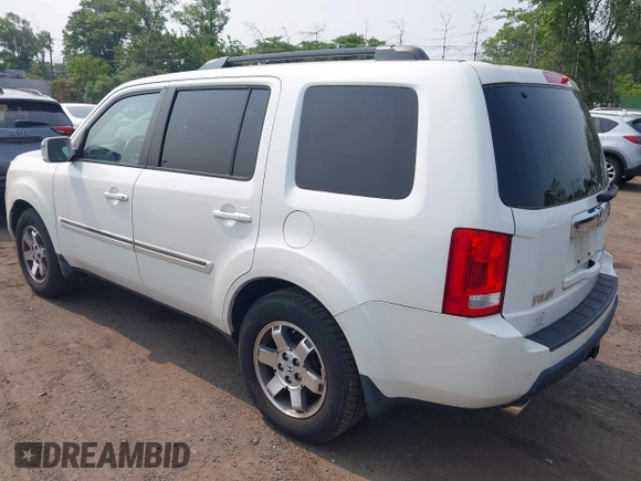 2011 Honda Pilot Touring z VIN 5FNYF4H9XBB003469, wystawiony jako IAAI lot #42369323 z przebiegiem 201 958 mil mil oraz . Historia ofert i sprzedaży dostępna na DreamBid. Obrazek 3.