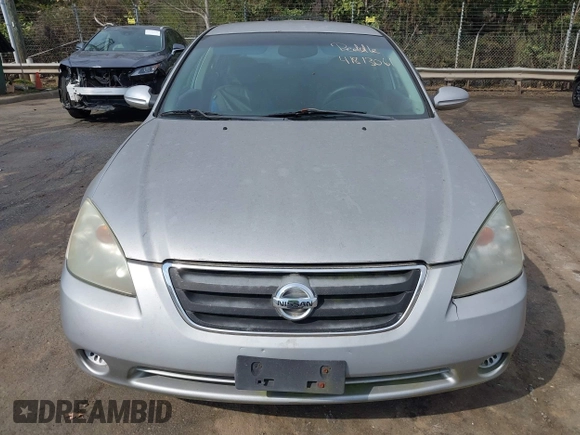2003 Nissan Altima S with VIN 1N4AL11D23C290009, listed as a IAAI auction lot 41813061 with 247,427 mi miles. Bid and sale history available at carsss.com. Image 6.