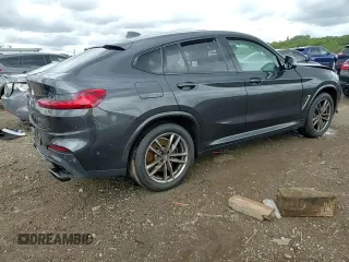 2021 BMW X4 M40i z VIN 5UX2V5C0XM9F04867, wystawiony jako Copart lot #57890555 z przebiegiem 40 563 mil mil oraz Szkoda całkowita • Salvage title. Historia ofert i sprzedaży dostępna na DreamBid. Obrazek 14.