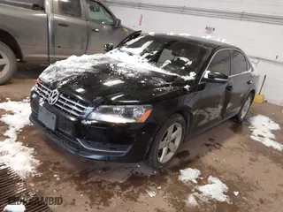 2013 Volkswagen Passat TDI SE with VIN 1VWBN7A39DC003511, listed as a IAAI auction lot 41469644 with 167,962 mi miles. Bid and sale history available at carsss.com. Image 2.