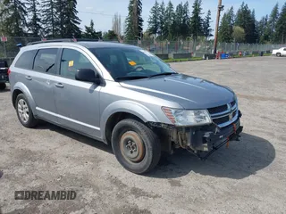 2016 Dodge Journey SE with VIN 3C4PDCAB2GT102871, listed as a IAAI auction lot 42009827 with 197,646 mi miles. Bid and sale history available at carsss.com. Image 1.