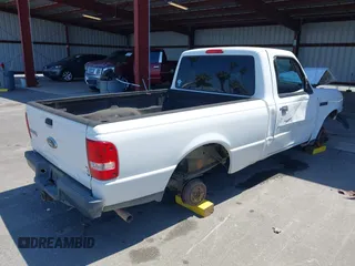 2009 Ford Ranger XL with VIN 1FTYR10D19PA26421, listed as a IAAI auction lot 42140982 with 121,689 mi miles. Bid and sale history available at carsss.com. Image 4.