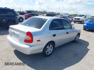 2002 Hyundai Accent GL with VIN KMHCG45C82U268756, listed as a IAAI auction lot 41569829 with 89,752 mi miles. Bid and sale history available at carsss.com. Image 4.