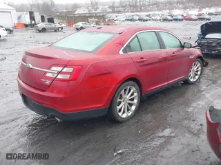 2015 Ford Taurus Limited with VIN 1FAHP2J89FG110114, listed as a IAAI auction lot 41568641 with 153,579 mi miles. Bid and sale history available at carsss.com. Image 4.