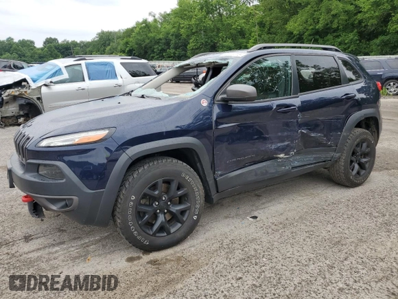2015 Jeep Cherokee Trailhawk with VIN 1C4PJMBB8FW740452, listed as a Copart auction lot 63023715 with 96,236 mi miles and Salvage title. Bid and sale history available at DreamBid. Image 1.
