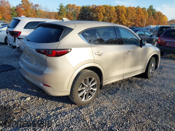 2024 Mazda CX-5 2.5 S Premium Package with VIN JM3KFBDL7R0470375, listed as a IAAI auction lot 40657155 with 8,584 mi miles. Bid and sale history available at carsss.com. Image 4.