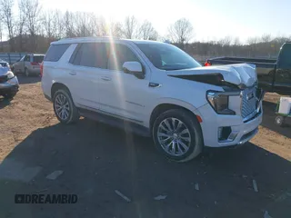 2021 GMC Yukon Denali with VIN 1GKS2DKL2MR458128, listed as a IAAI auction lot 41343876 with 64,732 mi miles. Bid and sale history available at carsss.com. Image 1.