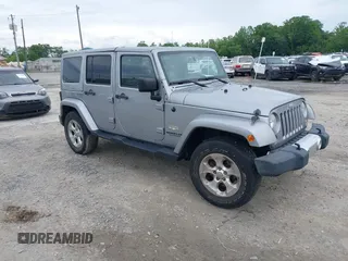 2014 Jeep Wrangler Unlimited Polar with VIN 1C4BJWEG8EL274387, listed as a IAAI auction lot 42388855 with 113,609 mi miles and . Bid and sale history available at DreamBid. Image 1.