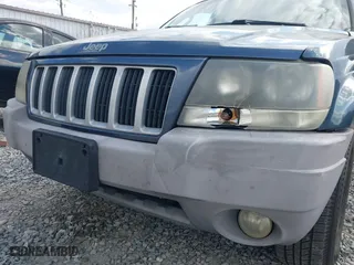 2004 Jeep Grand Cherokee Laredo with VIN 1J4GX48S14C324581, listed as a IAAI auction lot 41717938 with 213,178 mi miles. Bid and sale history available at carsss.com. Image 6.
