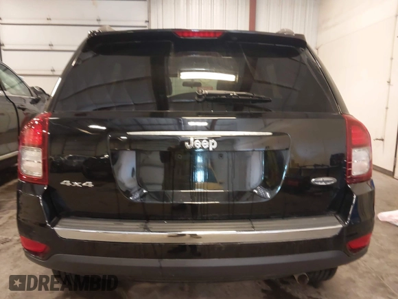 2015 Jeep Compass Latitude with VIN 1C4NJDEBXFD304409, listed as a IAAI auction lot 41629121 with 123,486 mi miles. Bid and sale history available at carsss.com. Image 17.