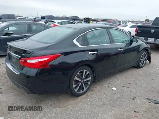 2016 Nissan Altima S with VIN 1N4AL3AP1GN380316, listed as a IAAI auction lot 41634055 with 146,454 mi miles and . Bid and sale history available at carsss.com. Image 4.