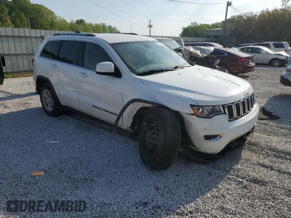 2019 Jeep Grand Cherokee Laredo E with VIN 1C4RJEAG2KC732645, listed as a Copart auction lot 53336495 with 76,221 mi miles and Salvage title. Bid and sale history available at DreamBid. Image 4.