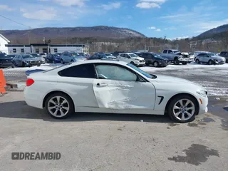 2015 BMW 4 Series 428i xDrive z VIN WBA3N5C52FK198674, wystawiony jako IAAI lot #41600235 z przebiegiem 62 442 mil mil oraz . Historia ofert i sprzedaży dostępna na DreamBid. Obrazek 14.