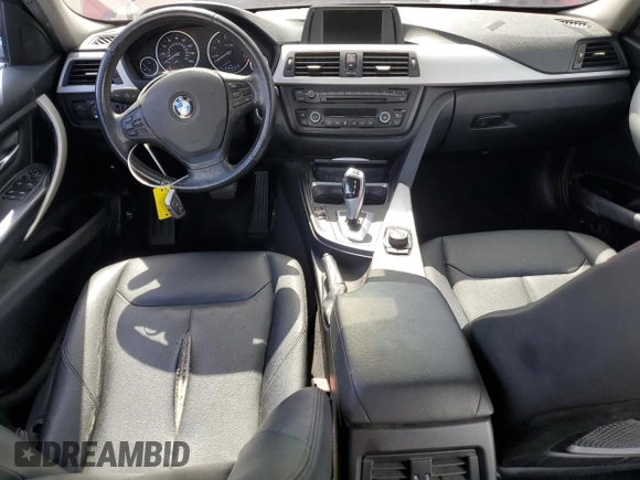 2013 BMW 3 Series 328i xDrive with VIN WBA3B3C5XDJ810958, listed as a Copart auction lot 60620005 with 143,589 mi miles and Salvage title. Bid and sale history available at DreamBid. Image 8.