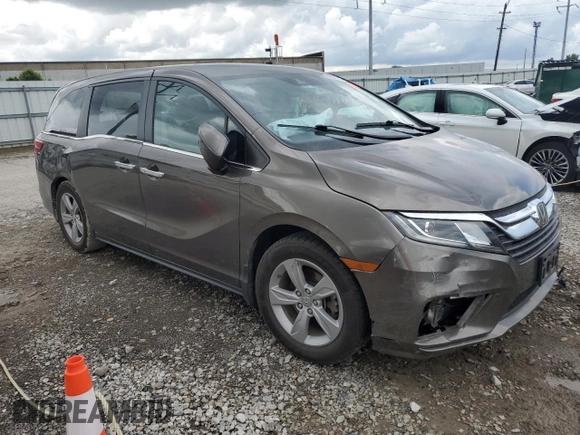 2019 Honda Odyssey EX-L z VIN 5FNRL6H79KB133976, wystawiony jako Copart lot #56988215 z przebiegiem Nie podano mil oraz Szkoda całkowita • Salvage title. Historia ofert i sprzedaży dostępna na DreamBid. Obrazek 4.