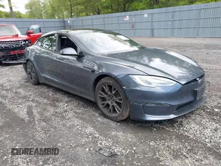 2022 Tesla Model S with VIN 5YJSA1E59NF469015, listed as a IAAI auction lot 42337579 with Not provided miles and . Bid and sale history available at DreamBid. Image 1.