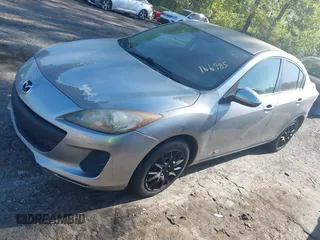 2013 Mazda 3 i SV with VIN JM1BL1TFXD1766985, listed as a IAAI auction lot 42033758 with 144,018 mi miles and . Bid and sale history available at DreamBid. Image 2.