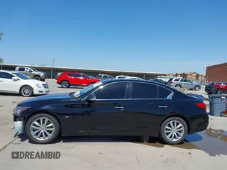 2015 Infiniti Q50 Premium with VIN JN1BV7AP9FM355526, listed as a IAAI auction lot 42010401 with 67,131 mi miles. Bid and sale history available at carsss.com. Image 15.