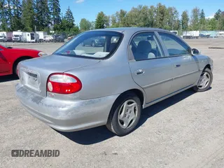 2001 Kia Sephia z VIN KNAFB121515092630, wystawiony jako IAAI lot #42361635 z przebiegiem 183 434 mil mil oraz . Historia ofert i sprzedaży dostępna na DreamBid. Obrazek 4.