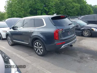 2022 Kia Telluride S z VIN 5XYP64HCXNG225885, wystawiony jako IAAI lot #42289777 z przebiegiem 87 296 mil mil oraz . Historia ofert i sprzedaży dostępna na DreamBid. Obrazek 3.
