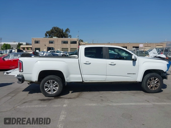 2019 GMC Canyon 2WD SLE z VIN 1GTG5CEN1K1210562, wystawiony jako IAAI lot #42419697 z przebiegiem 115 702 mil mil oraz . Historia ofert i sprzedaży dostępna na DreamBid. Obrazek 14.