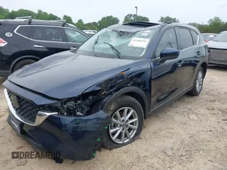 2023 Mazda CX-5 S Carbon Edition z VIN JM3KFBCM6P0251947, wystawiony jako IAAI lot #42286595 z przebiegiem 9 434 mil mil oraz . Historia ofert i sprzedaży dostępna na DreamBid. Obrazek 2.