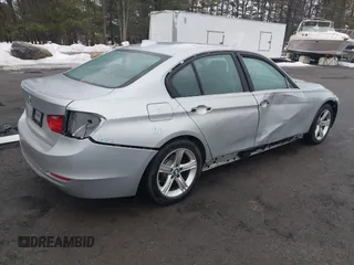 2013 BMW 3 Series 328i xDrive with VIN WBA3B5C58DF594087, listed as a IAAI auction lot 41710362 with 185,994 mi miles. Bid and sale history available at carsss.com. Image 4.