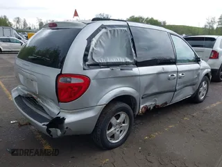 2005 Dodge Caravan SXT with VIN 1D4GP45R35B203472, listed as a IAAI auction lot 42198565 with 145,598 mi miles and . Bid and sale history available at carsss.com. Image 6.