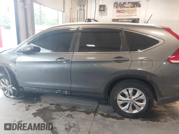 2012 Honda CR-V EX-L z VIN JHLRM4H78CC017235, wystawiony jako IAAI lot #42318504 z przebiegiem 161 069 mil mil oraz . Historia ofert i sprzedaży dostępna na DreamBid. Obrazek 14.