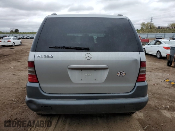 1999 Mercedes-Benz M 320/430/500 with VIN 4JGAB54E7XA078616, listed as a Copart auction lot 55301695 with 137,918 mi miles and Salvage title. Bid and sale history available at DreamBid. Image 6.