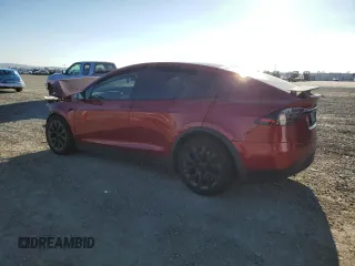 2023 Tesla Model X with VIN 7SAXCBE54PF426469, listed as a Copart auction lot 51019955 with Not Provided miles and Salvage Title. Bid and sale history available at DreamBid. Image 2.