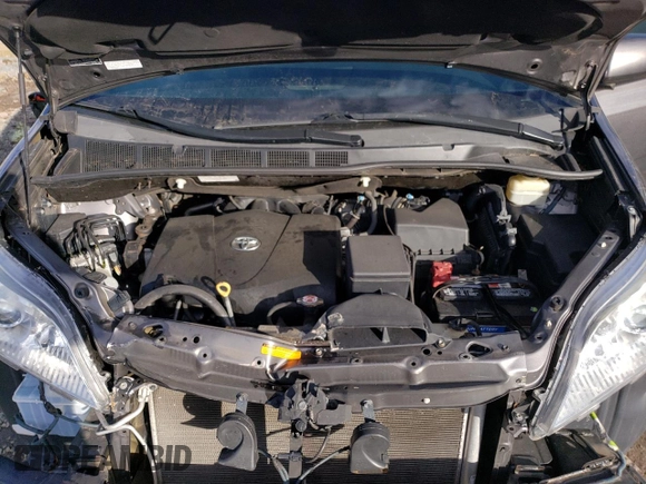2017 Toyota Sienna XLE z VIN 5TDDZ3DC7HS163170, wystawiony jako Copart lot #86436534 z przebiegiem 84 446 mil mil oraz Szkoda całkowita • Salvage title. Historia ofert i sprzedaży dostępna na DreamBid. Obrazek 12.