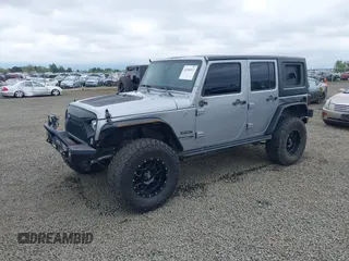2018 Jeep Wrangler Unlimited Sport S with VIN 1C4BJWDG4JL861052, listed as a IAAI auction lot 42100517 with 43,907 mi miles and . Bid and sale history available at DreamBid. Image 2.