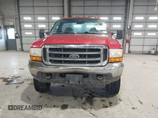 2000 Ford F-250 XL z VIN 1FTNF21L0YEB96710, wystawiony jako IAAI lot #41534150 z przebiegiem 296 680 mil mil oraz . Historia ofert i sprzedaży dostępna na DreamBid. Obrazek 13.