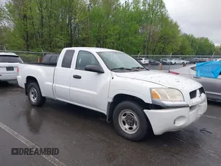 2007 Mitsubishi Raider LS with VIN 1Z7HC22K87S217299, listed as a IAAI auction lot 41983047 with 147,721 mi miles. Bid and sale history available at carsss.com. Image 1.