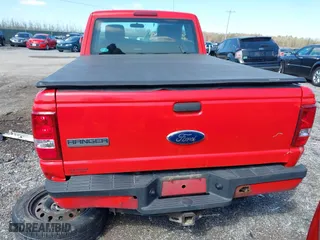2011 Ford Ranger XLT with VIN 1FTLR4FE5BPA57057, listed as a IAAI auction lot 41995162 with 238,987 mi miles. Bid and sale history available at carsss.com. Image 16.