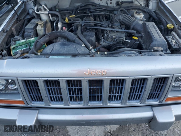 2001 Jeep Cherokee Sport with VIN 1J4FF58S71L576951, listed as a Copart auction lot 78390844 with 267,142 mi miles and Salvage title. Bid and sale history available at DreamBid. Image 12.